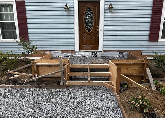 Forms set for a front landing and steps, with gravel base