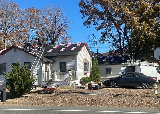 Crew working on a roof replacement